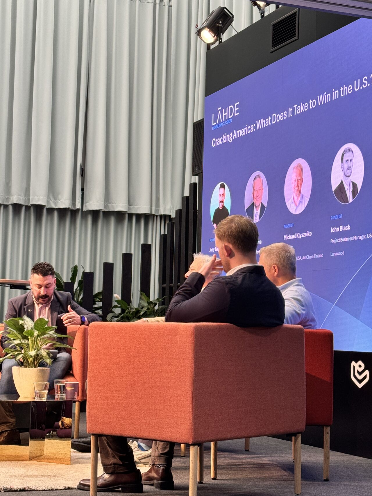 The Cracking America panel on stage at Scaling Opportunity in Helsinki